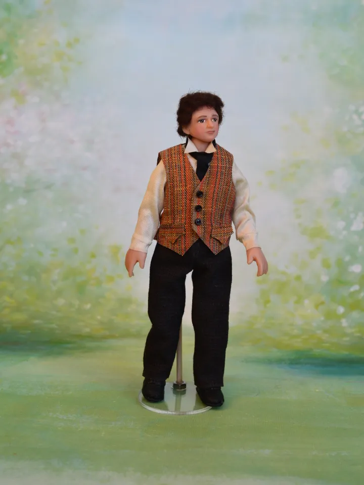 Miniature gentleman doll in 12 scale for a Victorian dollhouse.