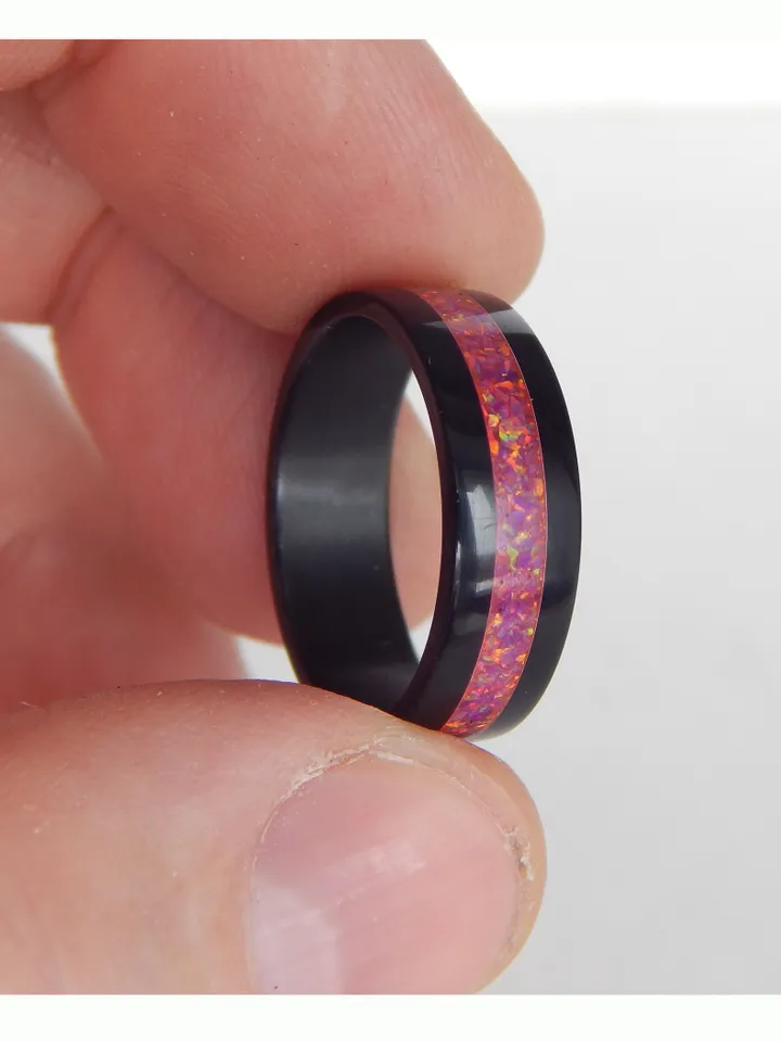 Stylish black ring. Carbon ring with synthetic opal. 8