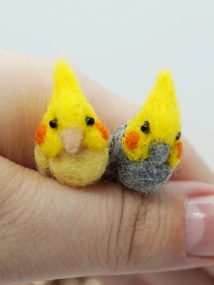 A pair of tiny needle felted miniature cockatiels, made to order