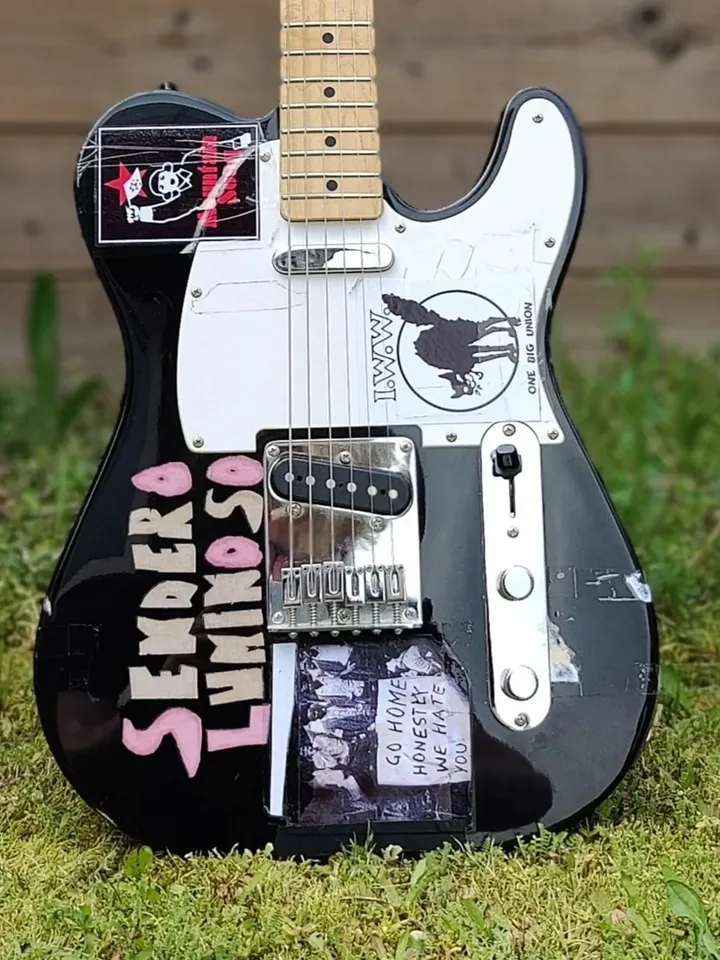 Tom Morello guitar stickers Sendero Luminoso Mau Mau uprising Fender Telecaster