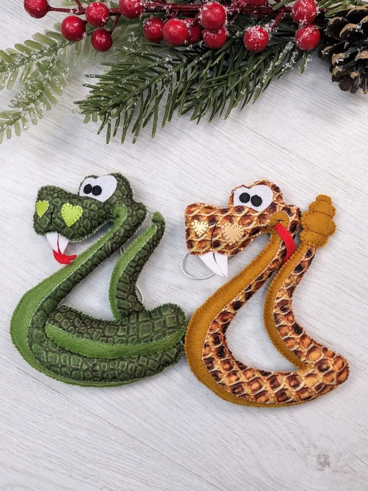 Felt snake. Green snake symbol of 2025 Christmas gift