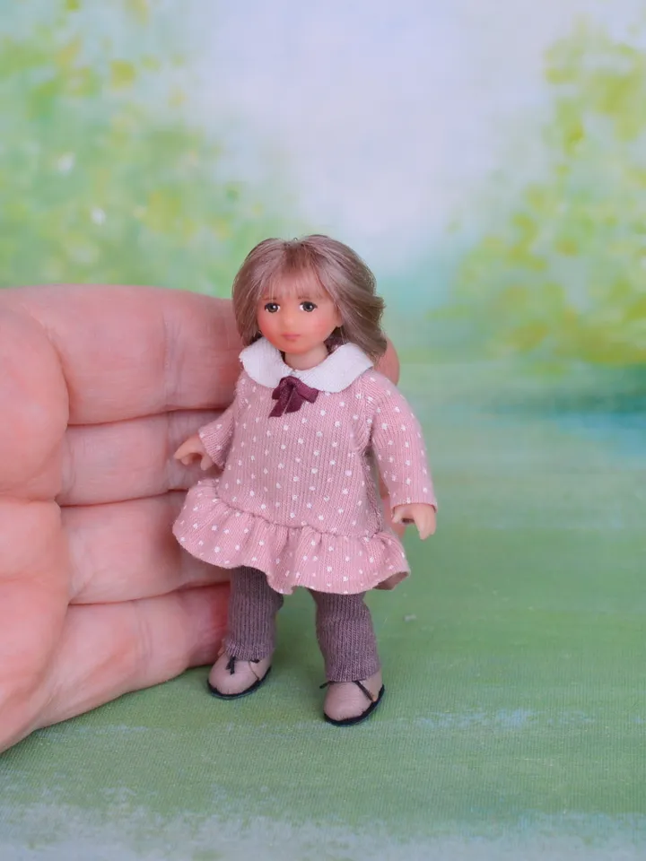 Miniature doll child in 12th scales