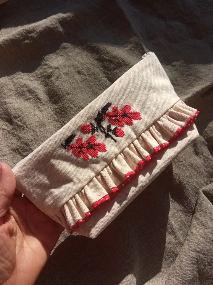 Cosmetic bag or pencil case made of linen with hand embroidery of a traditional Belarusian ornament