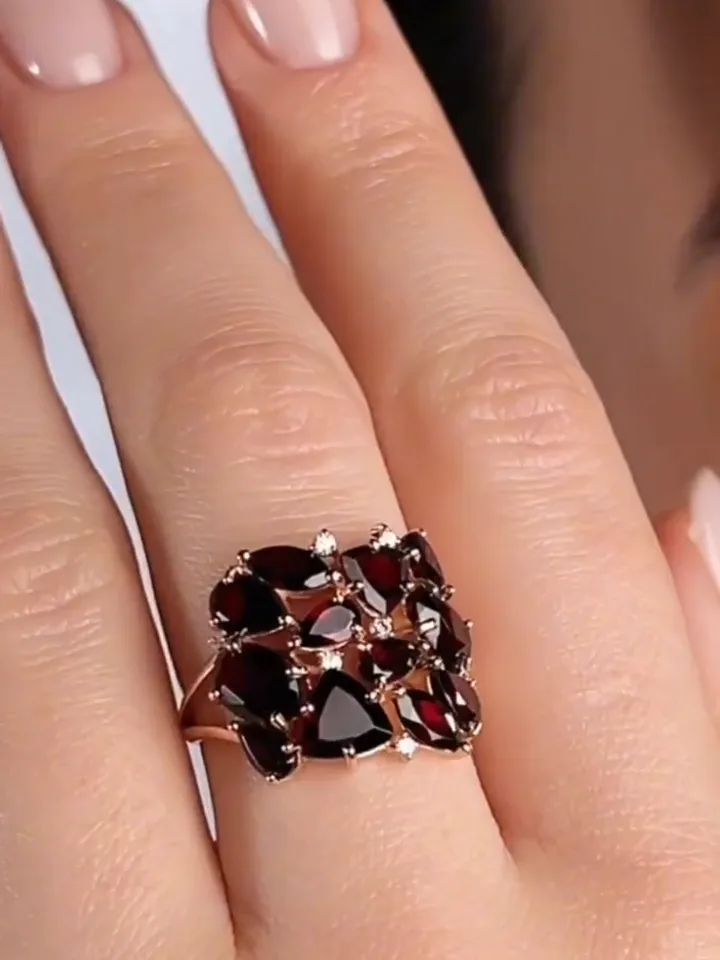Ring gold plated silver 925 assay value with garnets