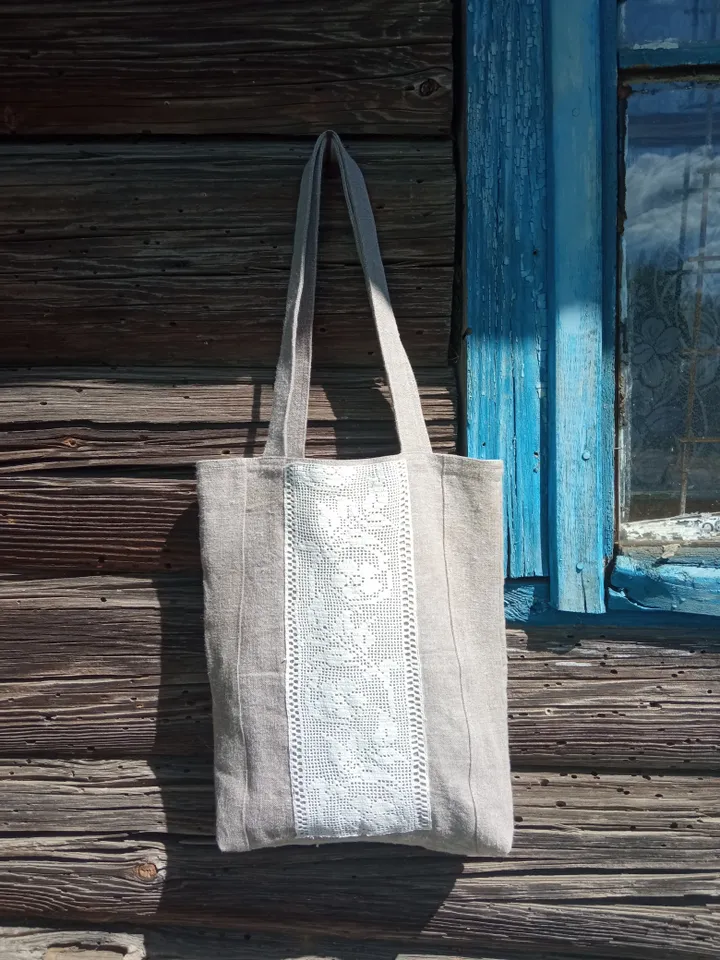 Handmade bag made of linen fabric with hand-knitted lace