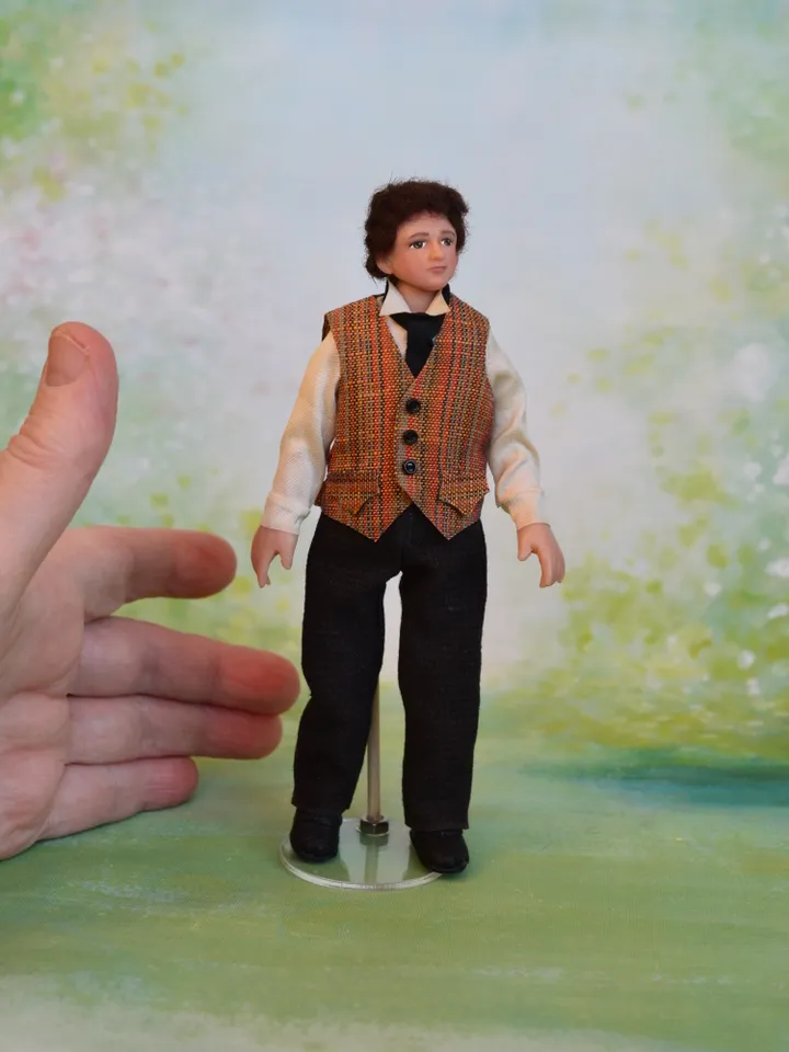 Miniature gentleman doll in 12 scale for a Victorian dollhouse.