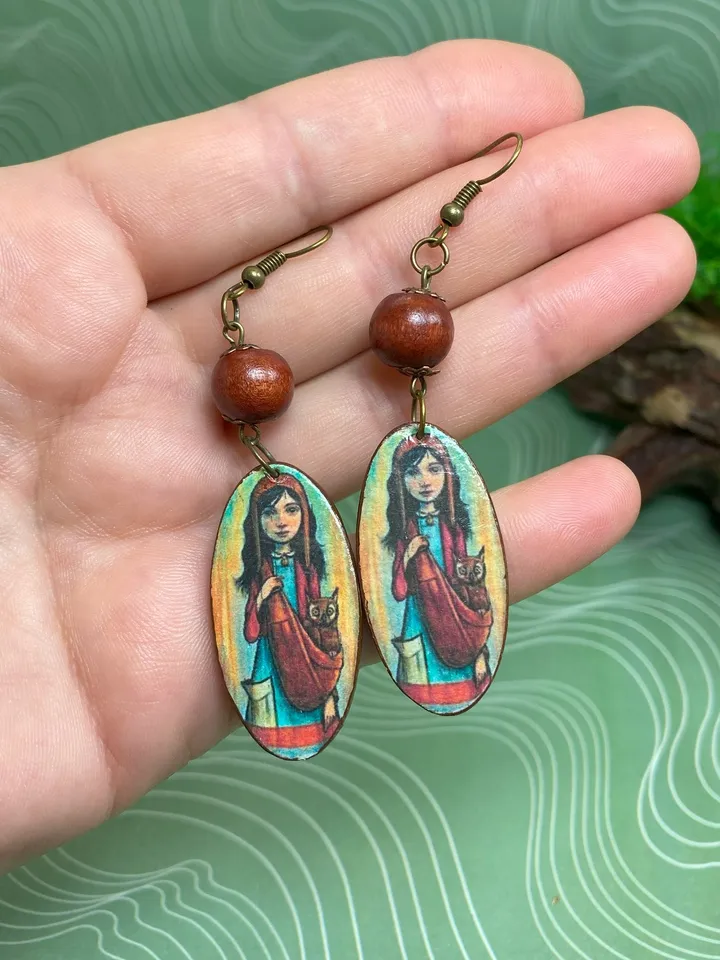 Handmade earrings. Author's design. Jewelry.Earrings with a picture of a girl. Wooden earrings.