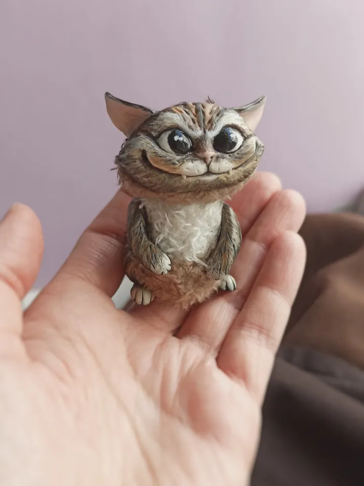 Sly cat art doll
