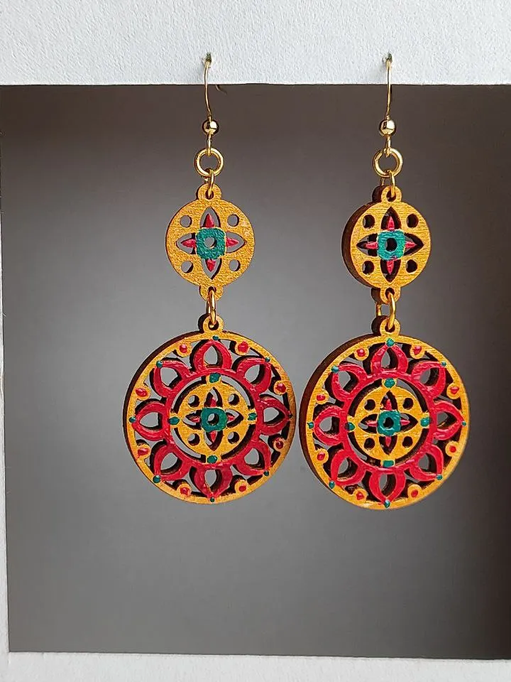 Bright ethnic earrings with hand painting