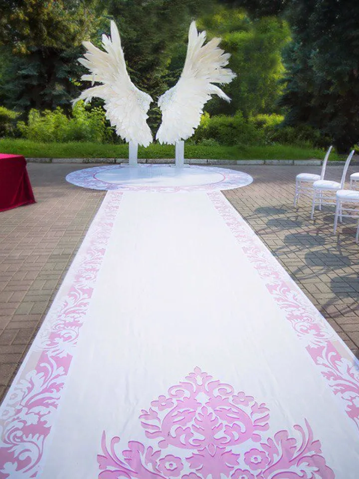 Giant angel wings wedding backdrop on metal stand, luxury street party decoration
