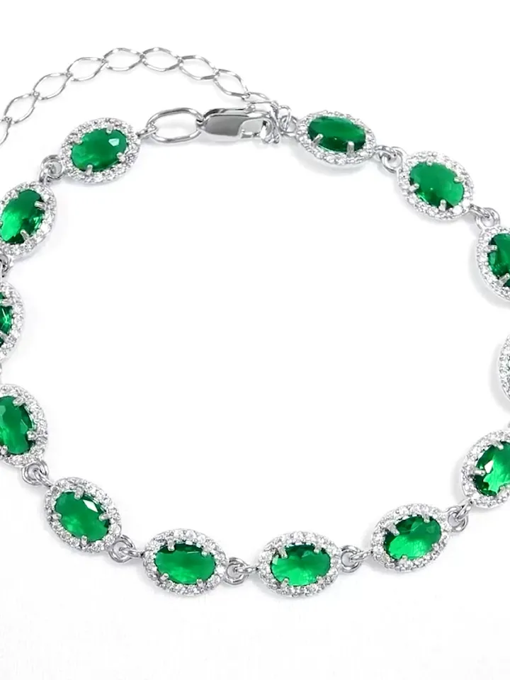 Women's silver bracelet 925 with emerald crystals and cubic zirconia