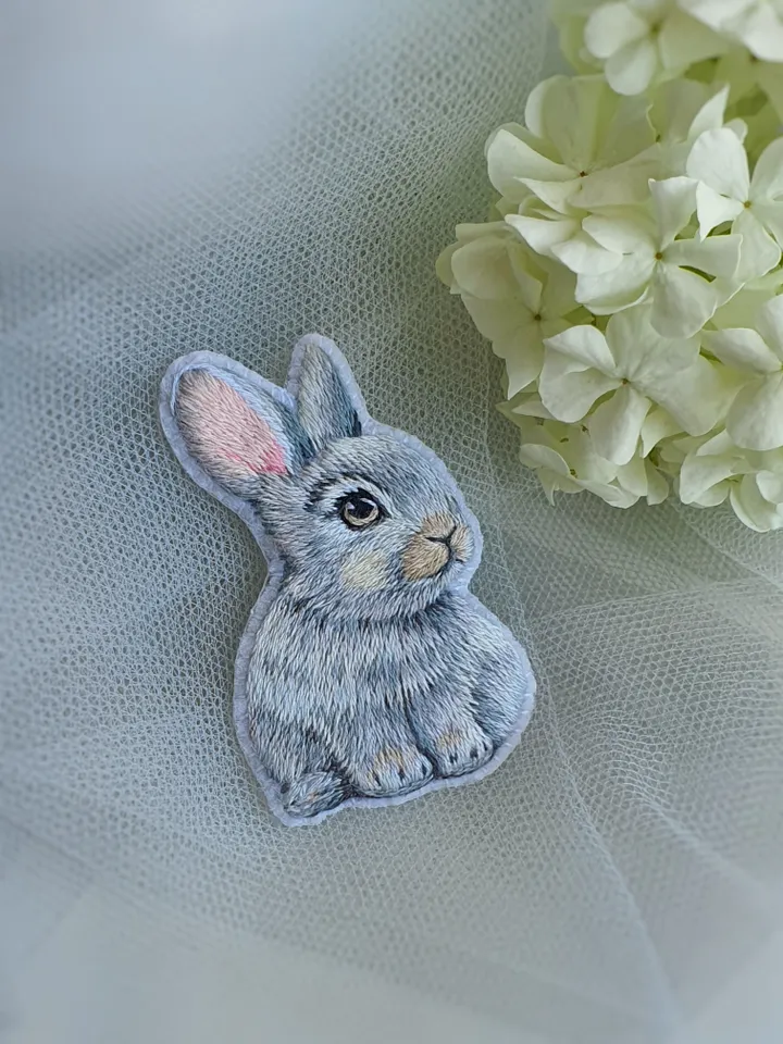 Tiny Bunny Brooch. An embroidered brooch in artistic satin stitch.