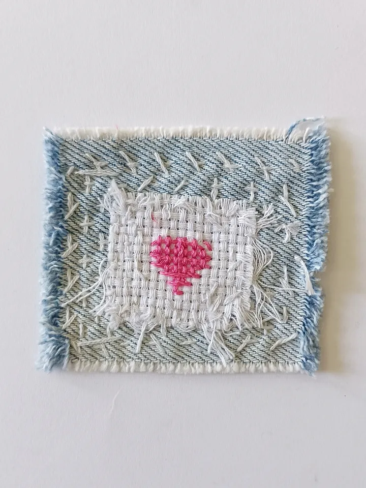Upcycled denim boro patch. Sashiko stitching.