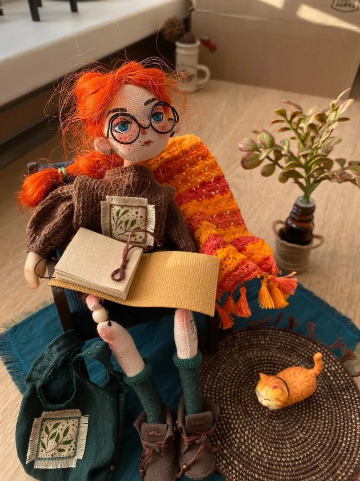 Red-haired doll with goblincore and cottagecore style with tattoos