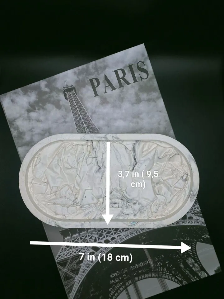 Decorative oval tray with a design solution made of plaster