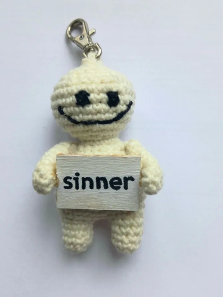 The keychain "sinner" for a bag or keys, a toy in the car interior, a pendant for the rearview mirror