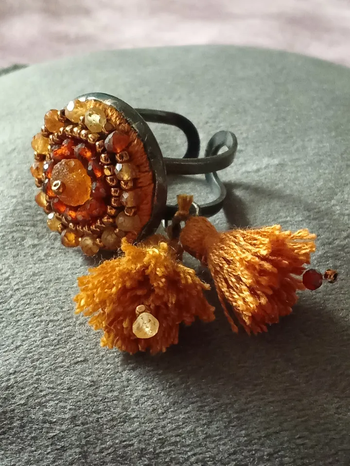 Garnet embroidered ring "Solaris"