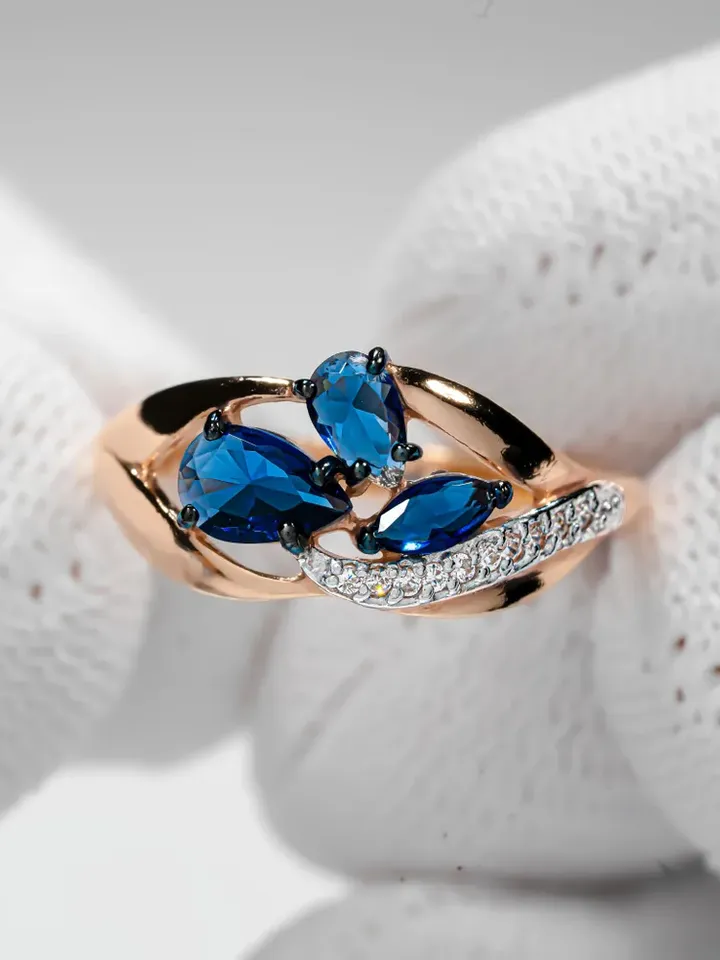 Ring Silver gold plated 925 assay value with sapphire