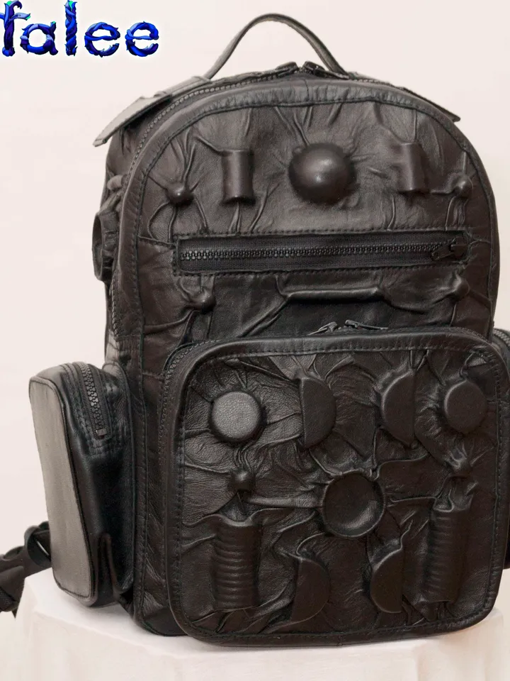 Backpack of genuine leather black color, 3D details modern style. Outdoor Casual Backpack.