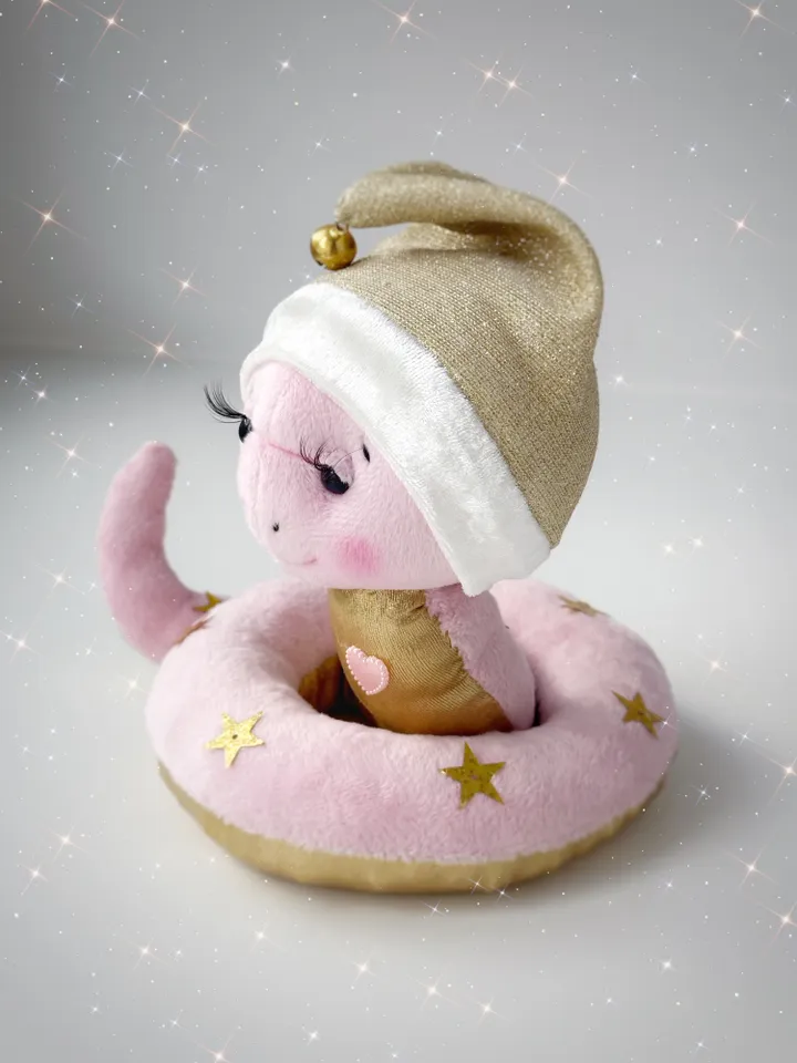 Christmas plush snakes. Handmade cute snakes in holiday hat for home decor. Christmas snakes for gift.