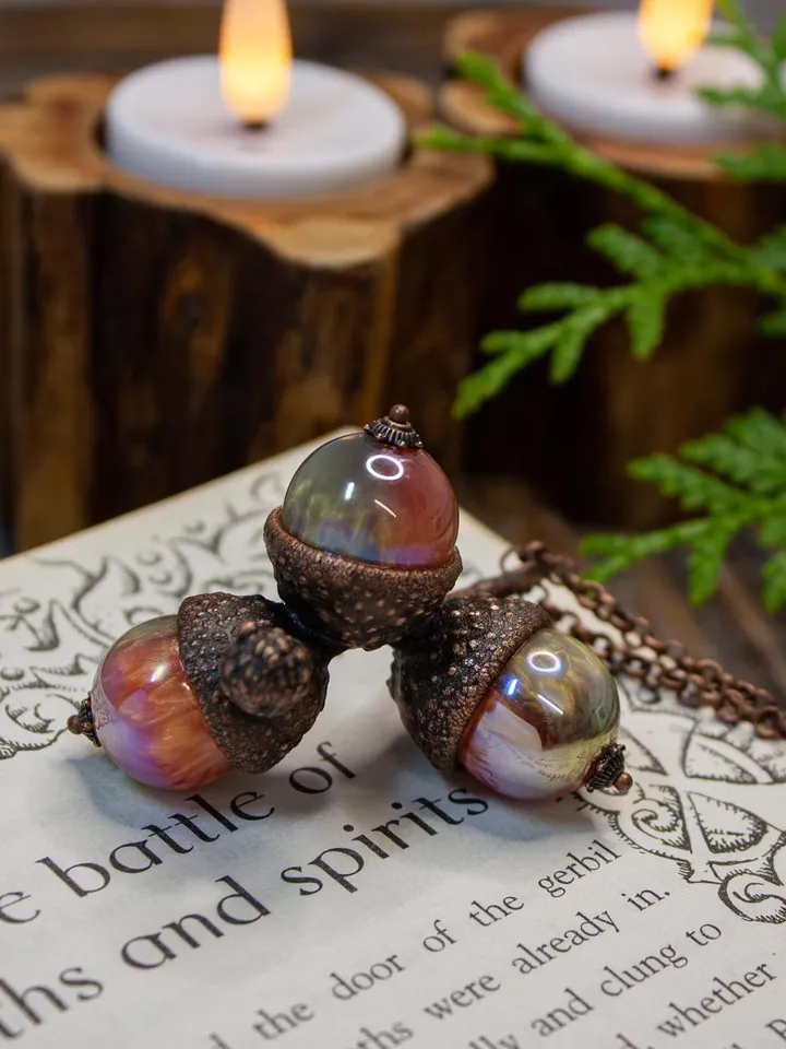 An original handmade electroformed copper pendant made from natural acorn caps in a single copy.