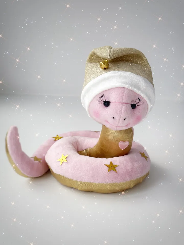 Christmas plush snakes. Handmade cute snakes in holiday hat for home decor. Christmas snakes for gift.