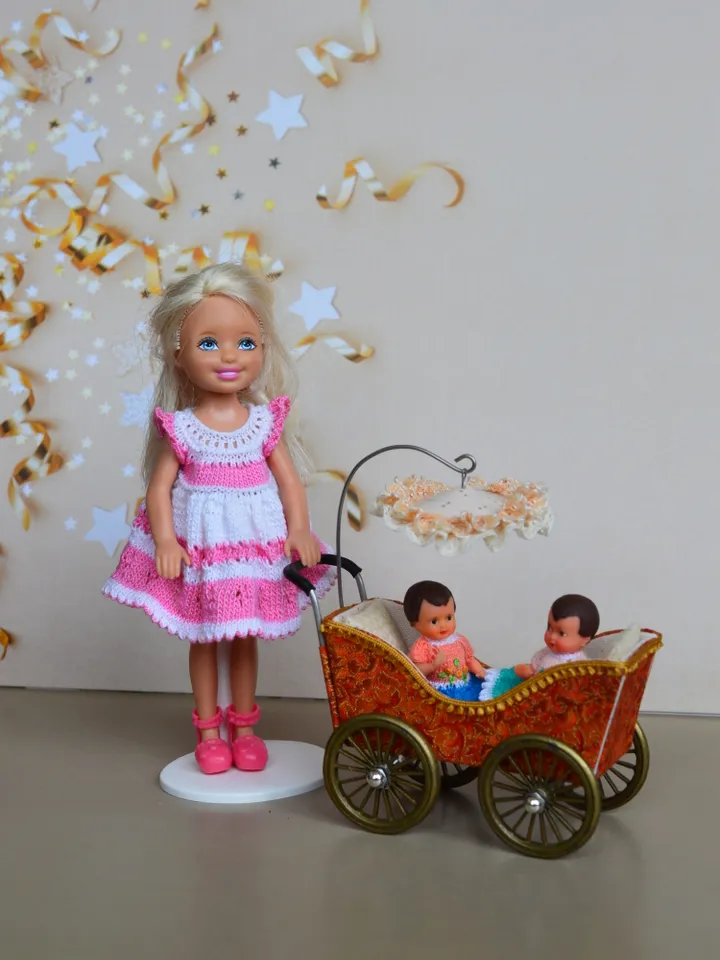 Miniature toy stroller for two small dolls. Handmade miniature stroller for small dolls.