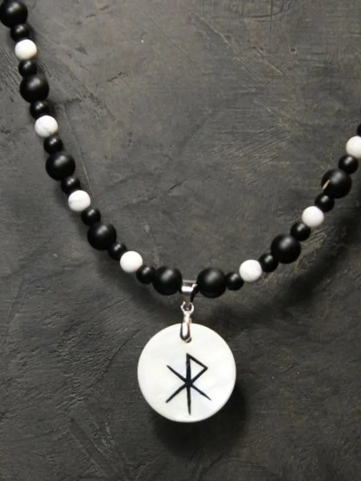Raven or crow necklace with love rune on the other side. Nacre pearl pendant