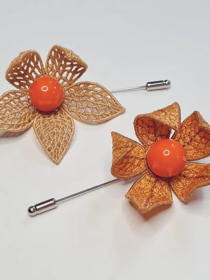 Machine embroidery design of paired Physalis brooches