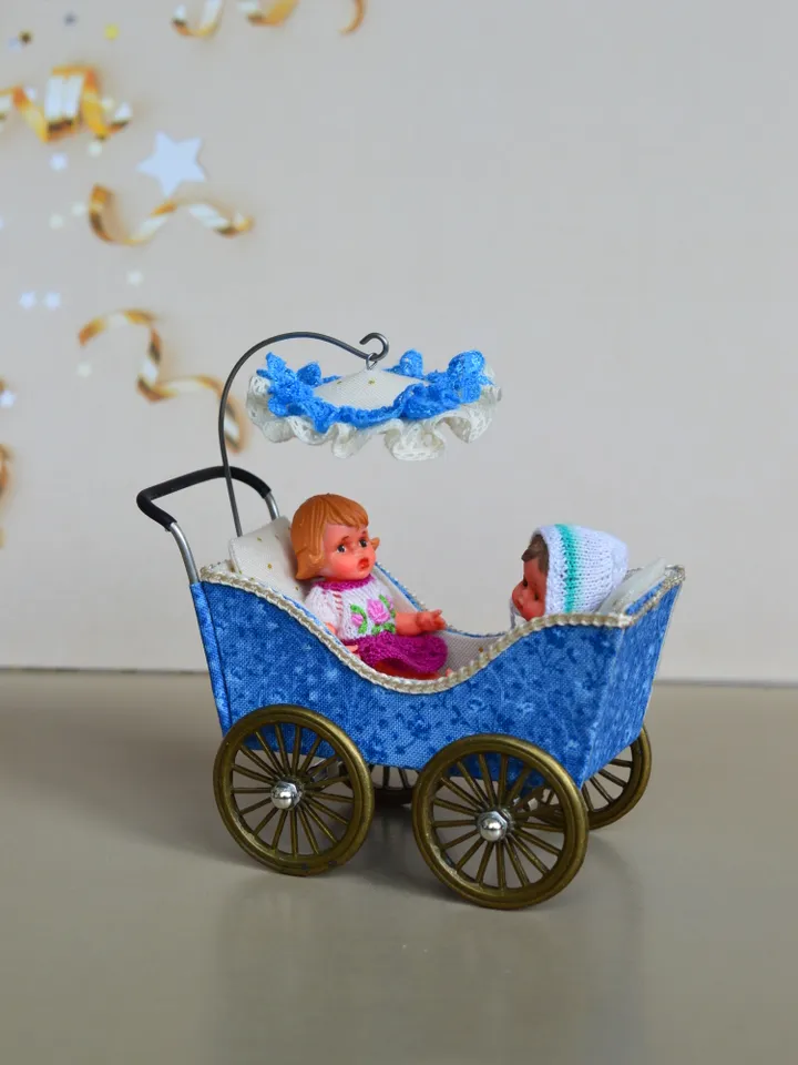 Miniature toy stroller for two small dolls. Handmade miniature stroller for small dolls.
