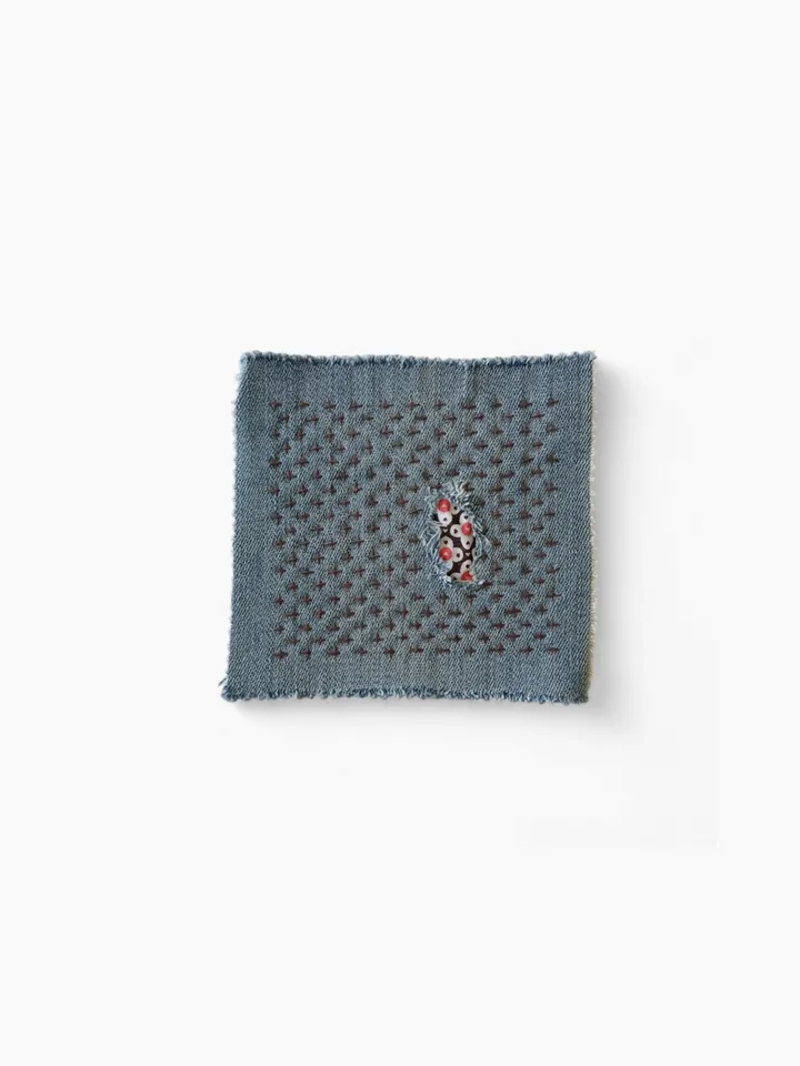 Upcycled denim boro patch. Sashiko stitching.