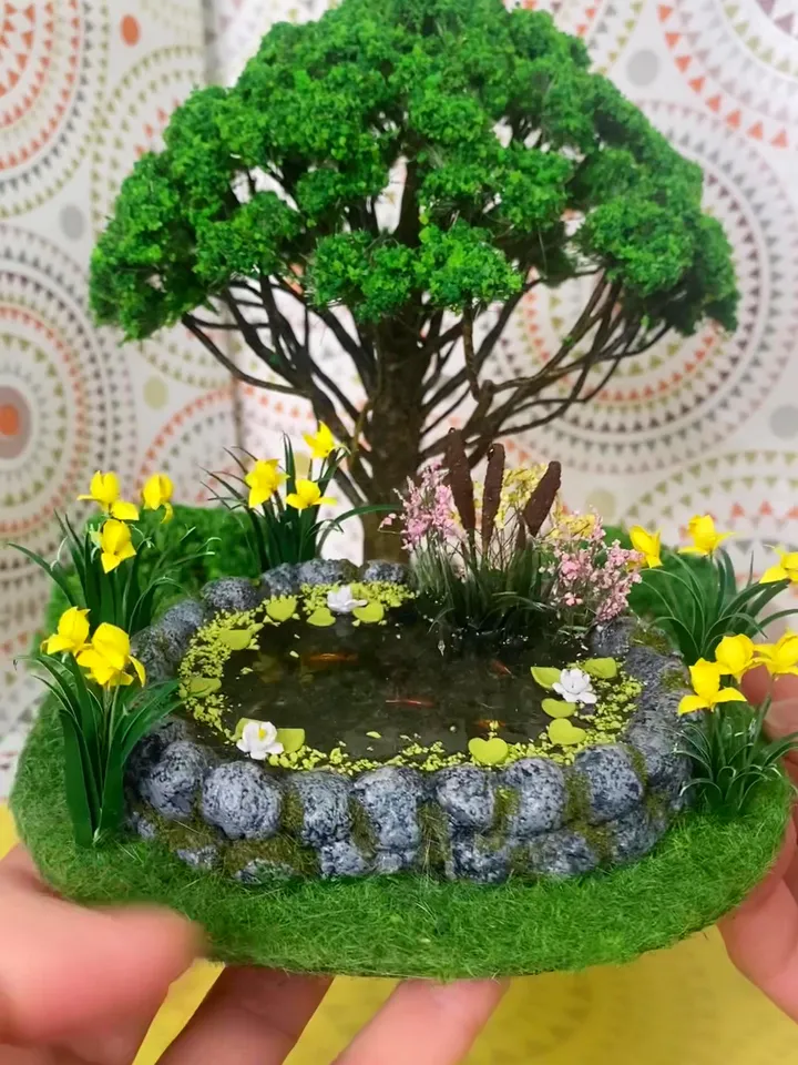 Miniature pond with goldfish. Dollhouse miniature. 1:12. Handmade pond. Pond with irises and fish.