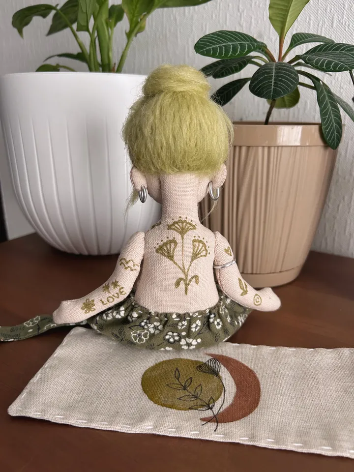 Textile doll yoga girl with green hair and tattoo