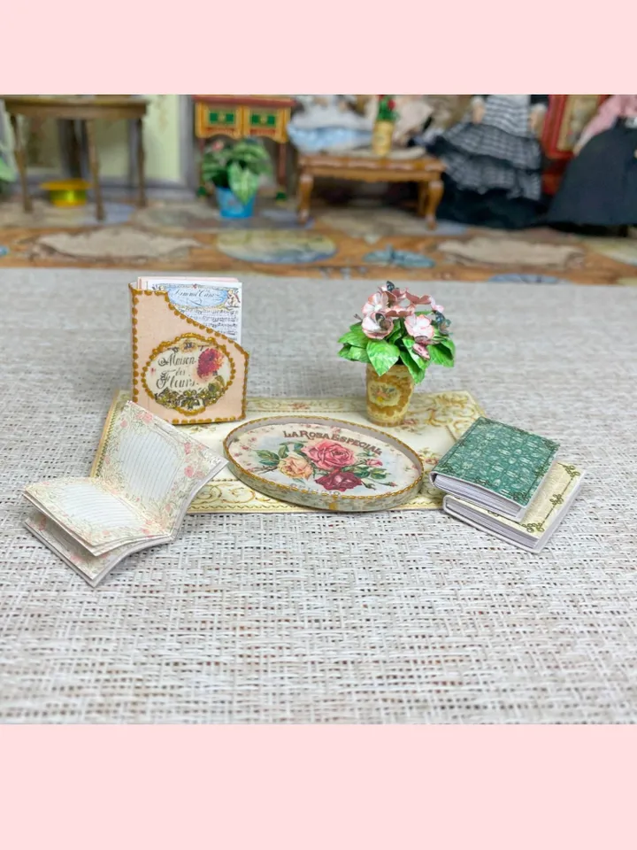 A set of accessories in beige and pink to fill the interior of a dollhouse in 1:12 scale.