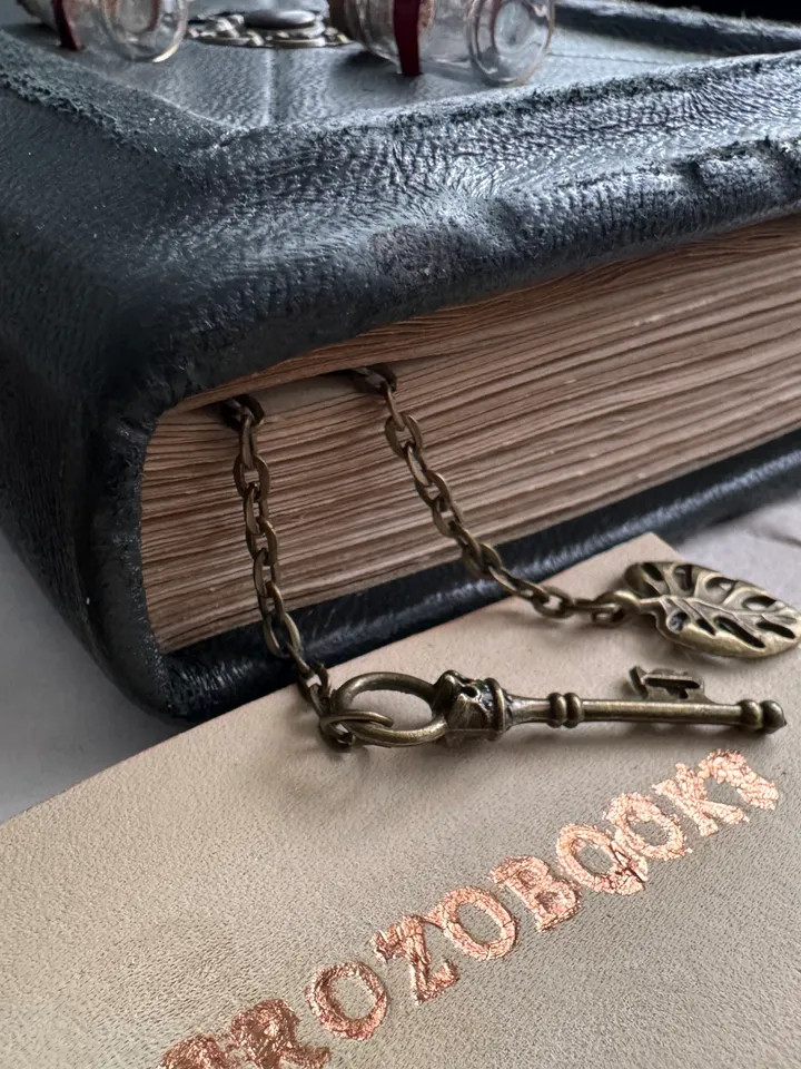 Genuine leather notebook with mini bottles on the cover. Grimoire, book of shadows, magical herbalist.