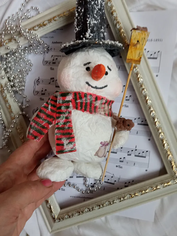 Funny Christmas snowman with birdhouse. Handmade. Xmas holidays. Christmas season. Christmas ornaments