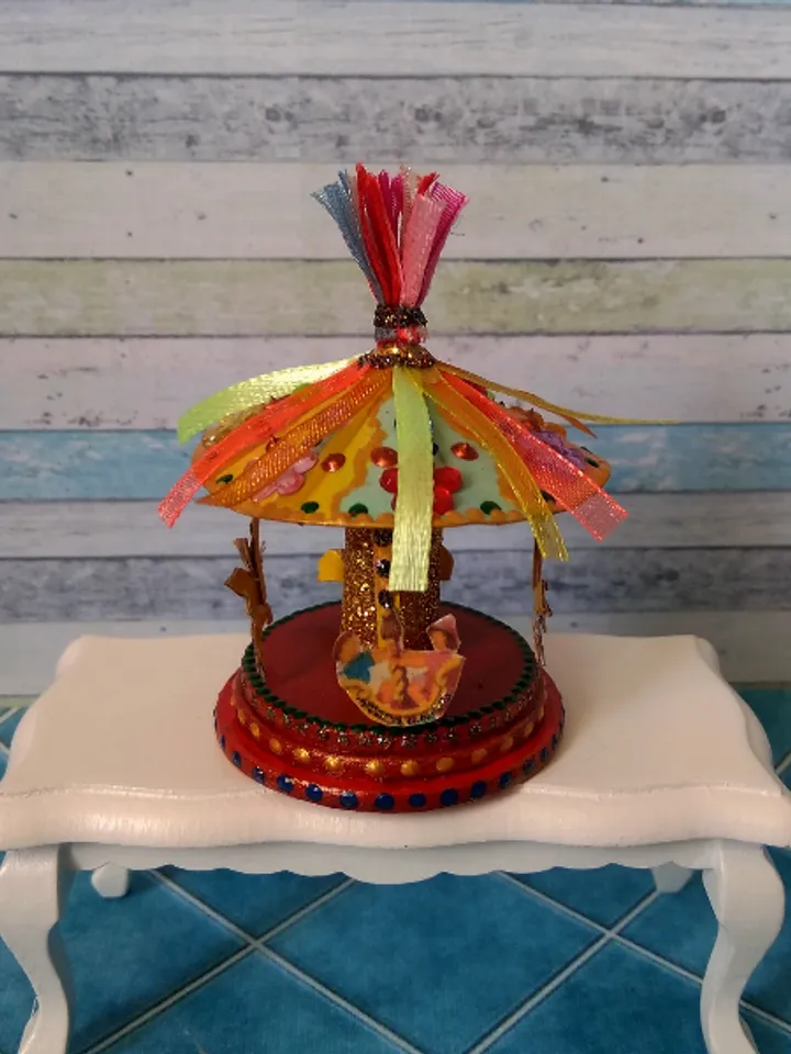 Miniature carousel. Dollhouse miniature.1:12 scale.