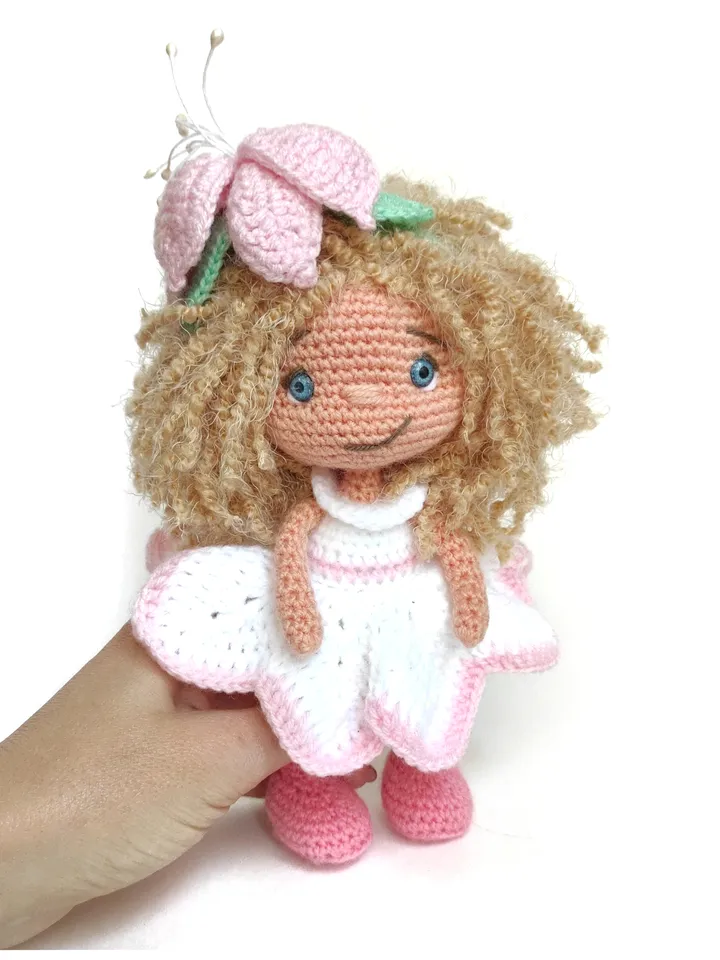 small doll in a white dress, flower girl doll
