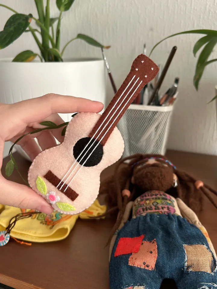 Textile doll Hippie man with tattoo and tiny felt guitar