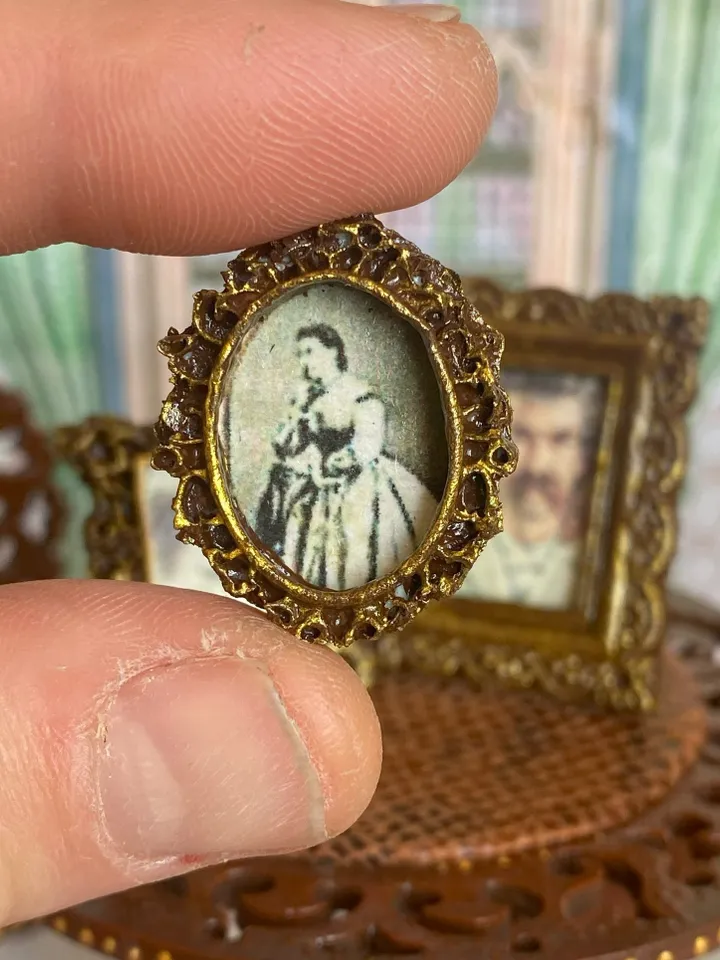 A set of photo frames for a dollhouse. Dollhouse miniature. 1:12. Dollhouse accessories.