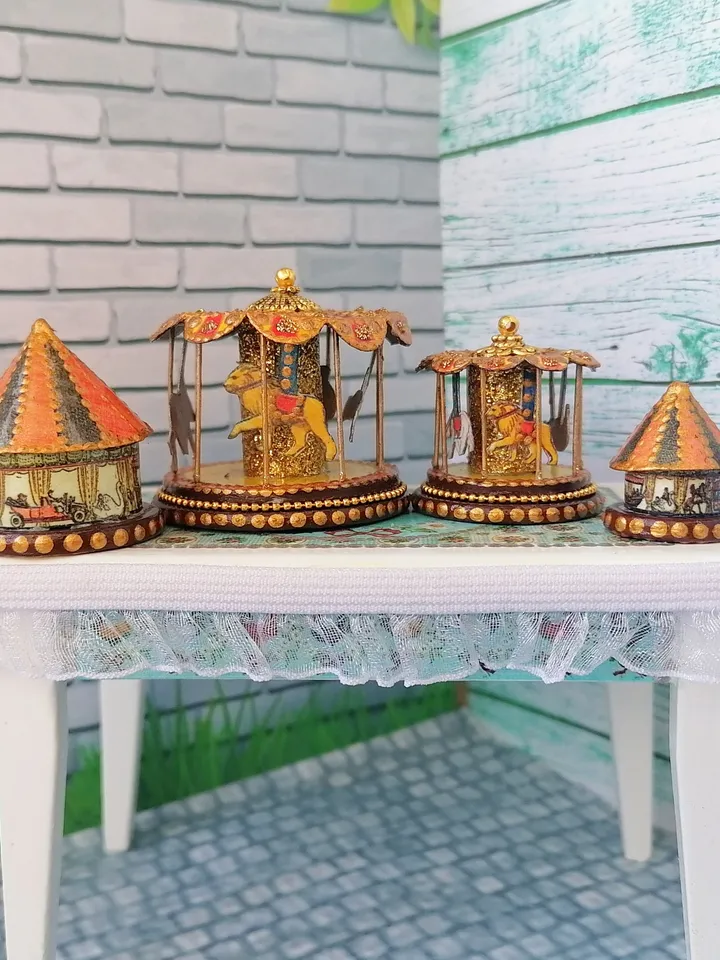 Miniature dollhouse carousel with gold trim. 1:12. Dollhouse miniature.