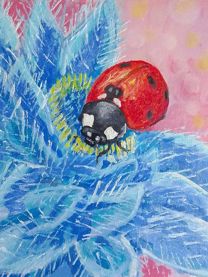 Painting flowers with a Ladybug