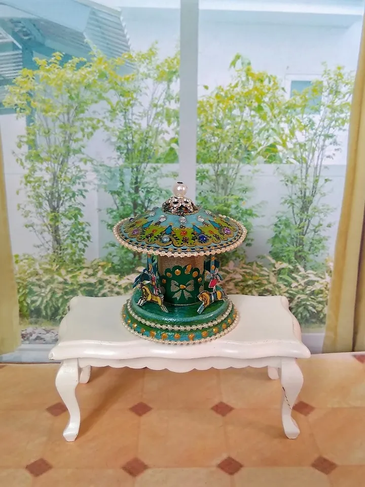 Miniature carousel. Dollhouse miniature.1:12 scale.
