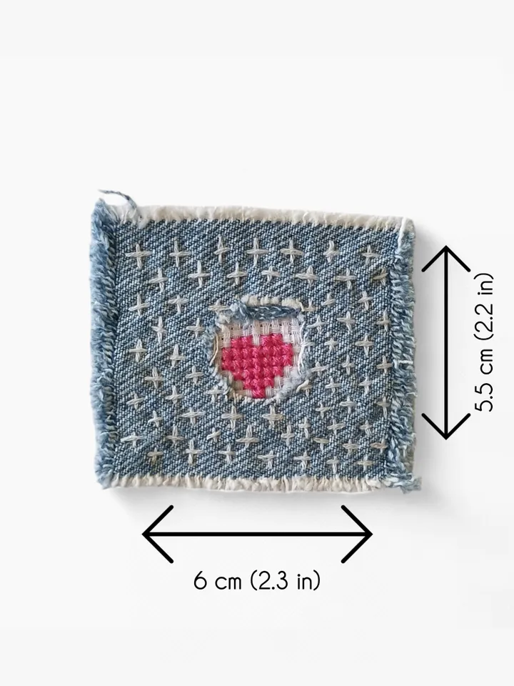 Upcycled denim boro patch. Sashiko stitching.