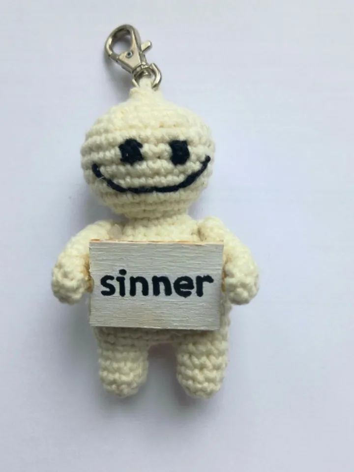 The keychain "sinner" for a bag or keys, a toy in the car interior, a pendant for the rearview mirror.