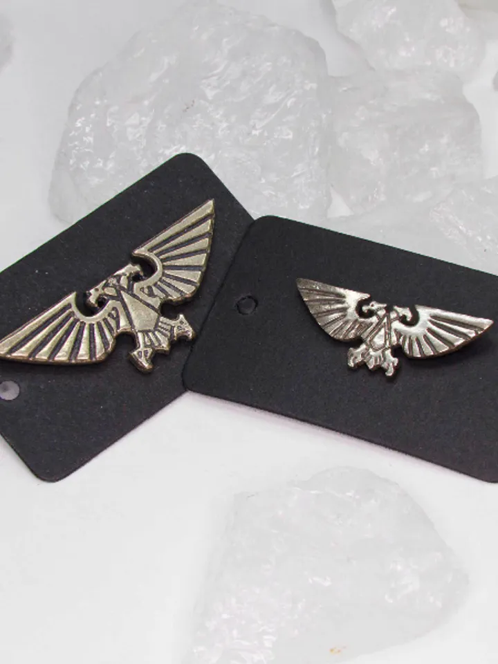 A pair of Large and Medium Imperial Aquila badges (German Silver CuNiZn)