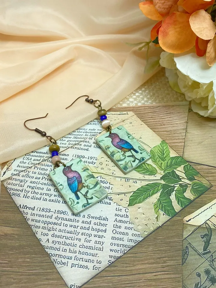Vintage handmade earrings. Earrings with images of birds.