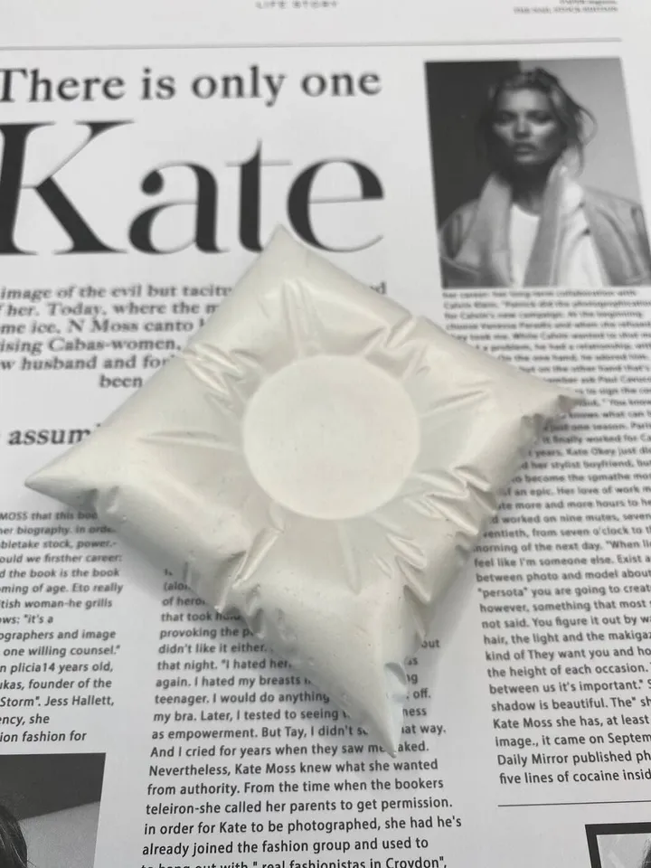 Stand for candlestick and jewelry made of plaster in the shape of a pillow