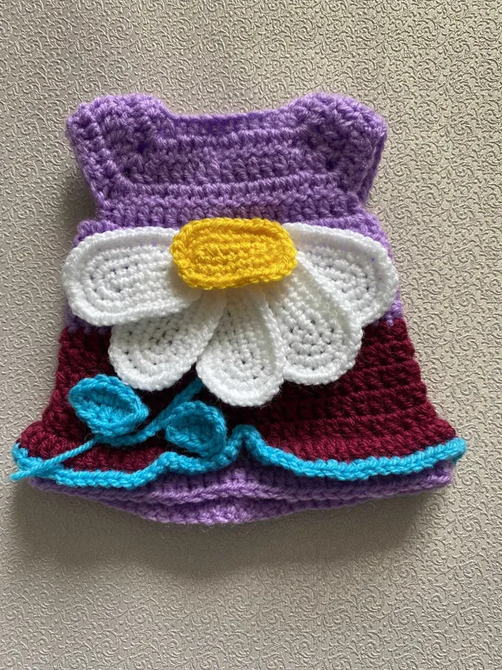 Crochet pattern doll in a daisy dress