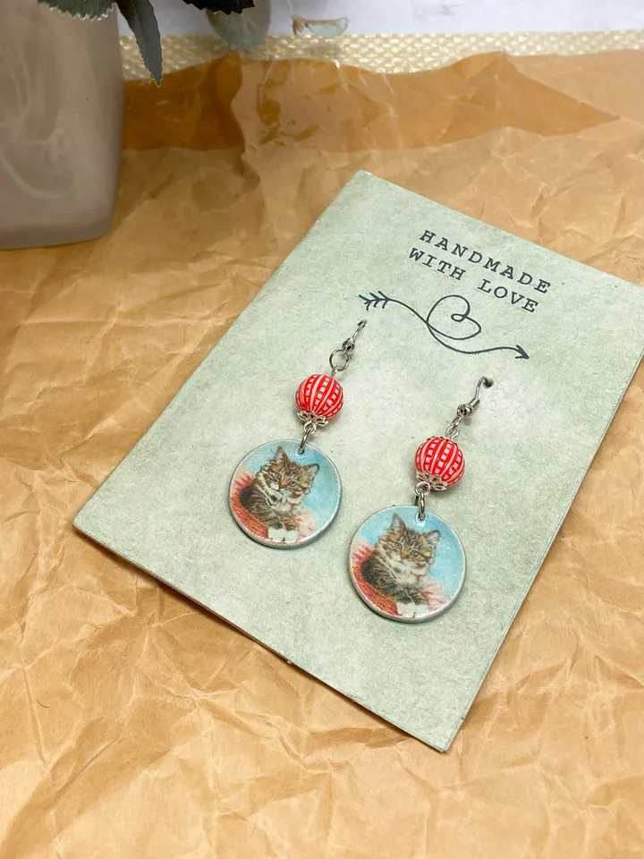 Handmade earrings. Earrings with beads. Handmade. Author's design. Earrings with images of cats.